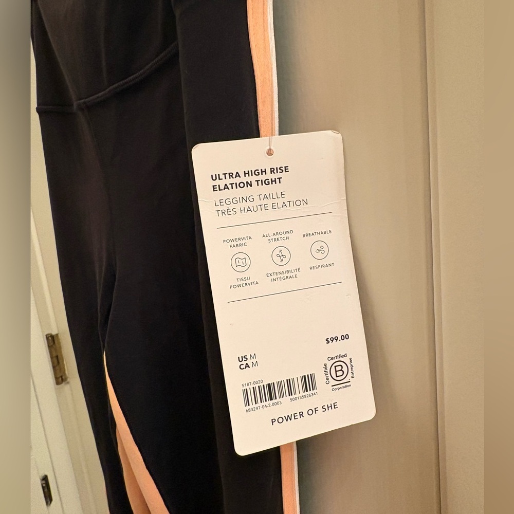 NWT Athleta elation high-rise tights. Black w/white & pink striping size medium.